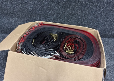 Approximately 117 leather belts, sizes 80-100