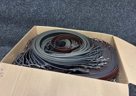 Approximately 150 leather belts, sizes 90-115