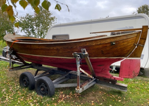 Wooden boat with motor