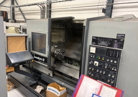 CNC lathe with associated tools - SMT Swedturn 12