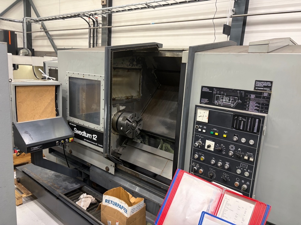 1591967-1 CNC lathe with associated tools - SMT Swedturn 12