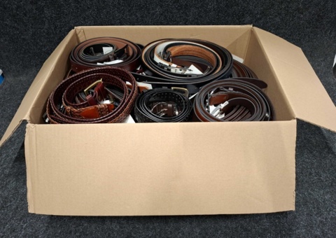 Approximately 136 leather belts, sizes 90-110