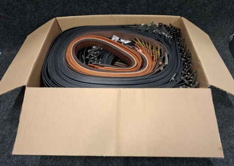 Approximately 145 leather belts, sizes 90-150