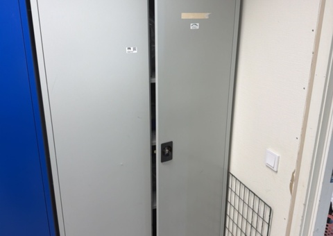Metal cabinet with various tools