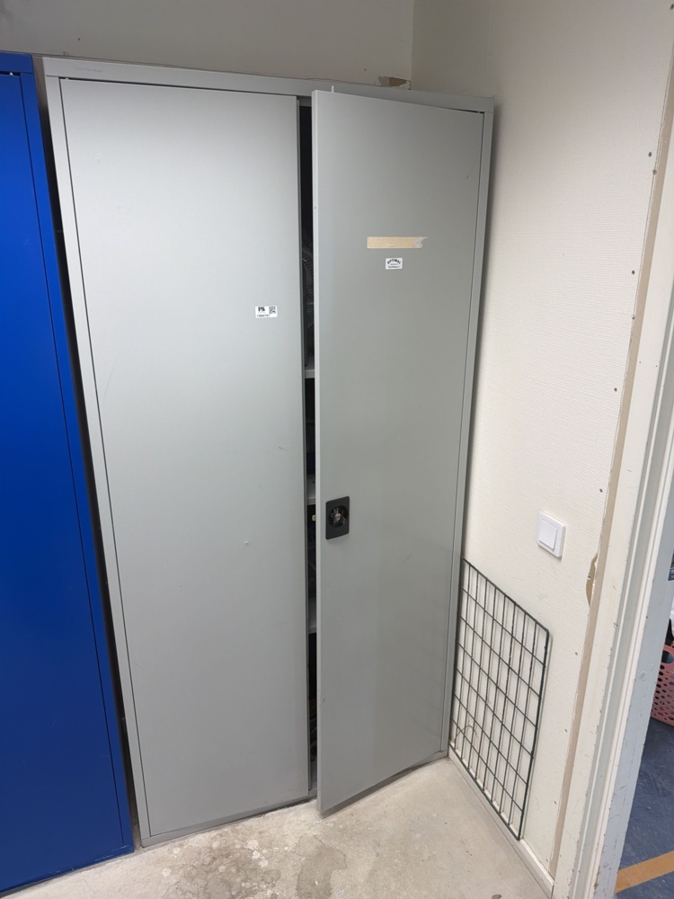 1594757-1 Metal cabinet with various tools