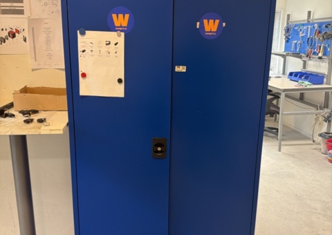 Metal cabinet with contents and desk
