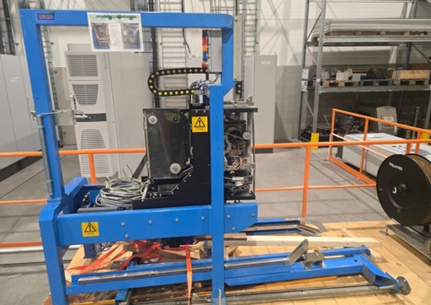 Automatic industrial strapping machine with electrical cabinet