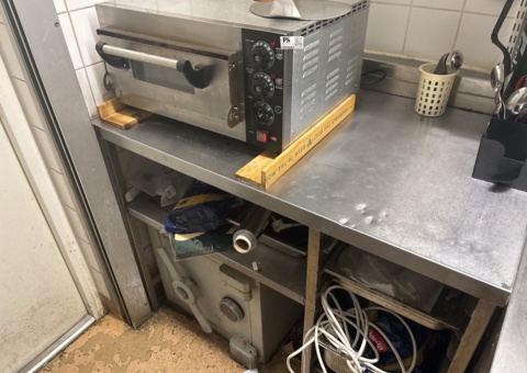 Pizza oven including stainless steel worktop