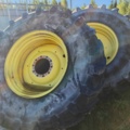 1603994-10 Däck på fälg från John Deere 7310R