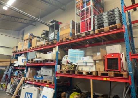 Pallet racking with plumbing parts, tools and equipment