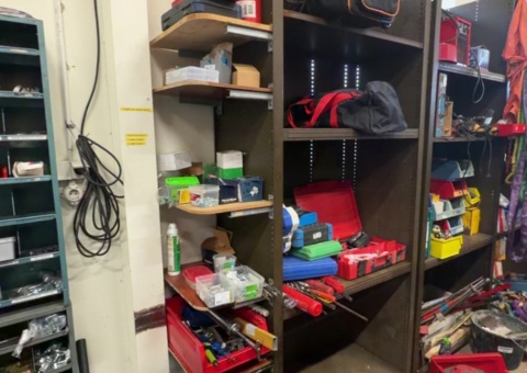 Sheet metal shelf with tools