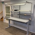 1594885-1 Height-adjustable packing bench with scales and lighting