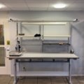 1594885-2 Height-adjustable packing bench with scales and lighting