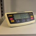 1594885-7 Height-adjustable packing bench with scales and lighting