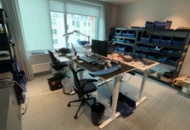 1548410 IT room with various equipment, components and furniture