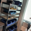 1548410-10 IT room with various equipment, components and furniture