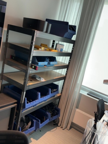 1548410-10 IT room with various equipment, components and furniture