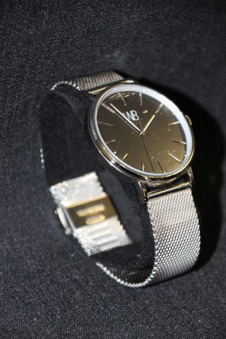 464940-42 4 wrist watches WB Watches