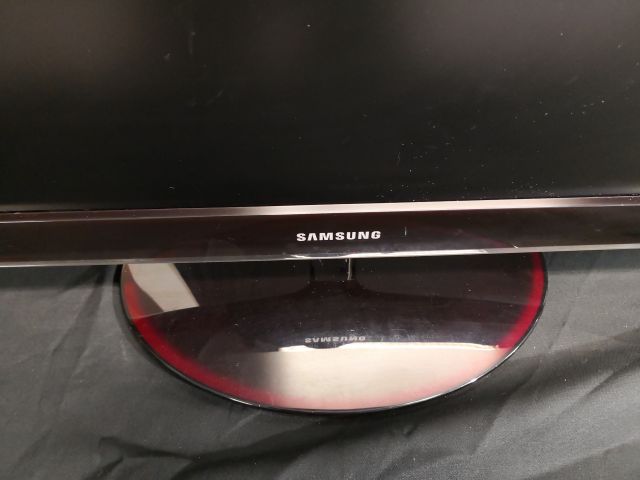 488784-11 40 inch Samsung TV and 27 inch samsung data screen
