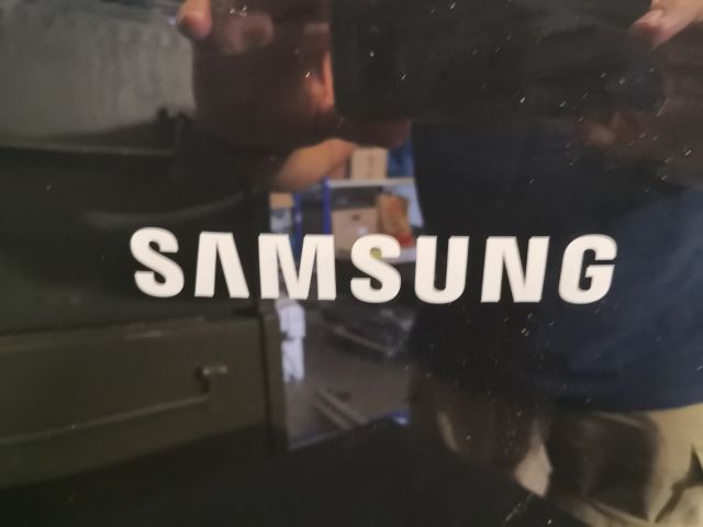 488784-13 40 inch Samsung TV and 27 inch samsung data screen
