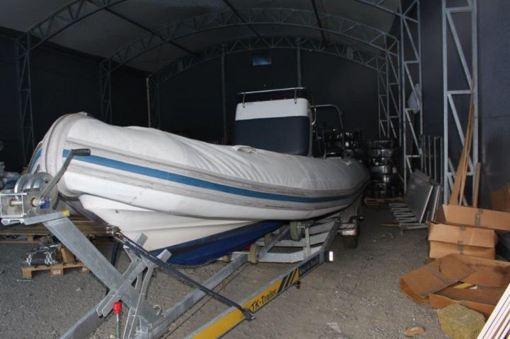 518357-7 Ribbed Ballistic -06 Evinrude G2 Motor incl. TK-Trailer BT2000