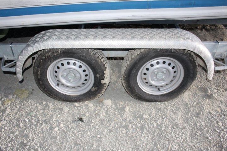 518357-43 Ribbed Ballistic -06 Evinrude G2 Motor incl. TK-Trailer BT2000