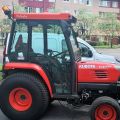 574802-3 Compact tractor Kubota STV 40 -10 (incl folding plow, sand spreader & tilt trailer)