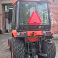 574802-5 Compact tractor Kubota STV 40 -10 (incl folding plow, sand spreader & tilt trailer)