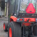 574802-6 Compact tractor Kubota STV 40 -10 (incl folding plow, sand spreader & tilt trailer)