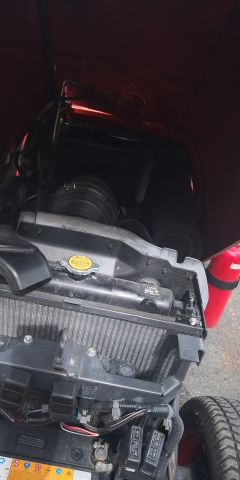 574802-22 Compact tractor Kubota STV 40 -10 (incl folding plow, sand spreader & tilt trailer)