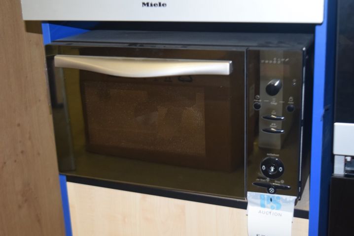 570545-1 Inbyggnadsmikro Whirlpool MT744/IX - visningsexemplar