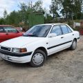 559810-2 Mazda 323 4-D 1.8l 16