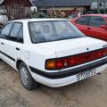 559810-3 Mazda 323 4-D 1.8l 16