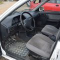 559810-8 Mazda 323 4-D 1.8l 16