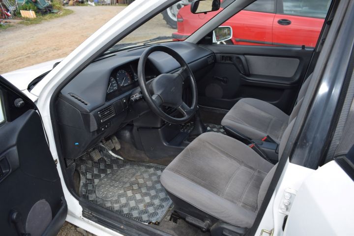 559810-8 Mazda 323 4-D 1.8l 16