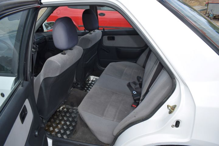 559810-9 Mazda 323 4-D 1.8l 16