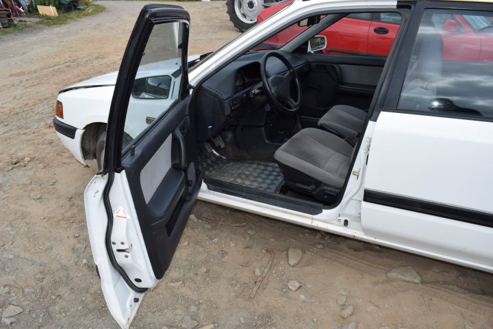 559810-10 Mazda 323 4-D 1.8l 16