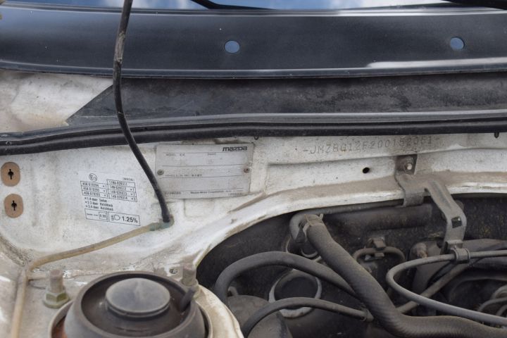 559810-13 Mazda 323 4-D 1.8l 16