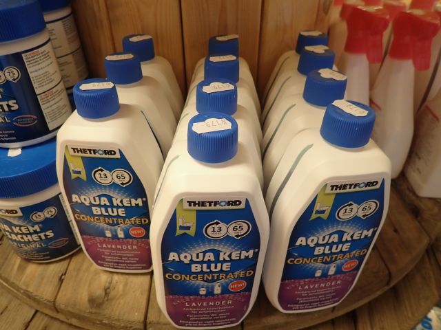 577614-1 11 bottles with Aqua Kem blue