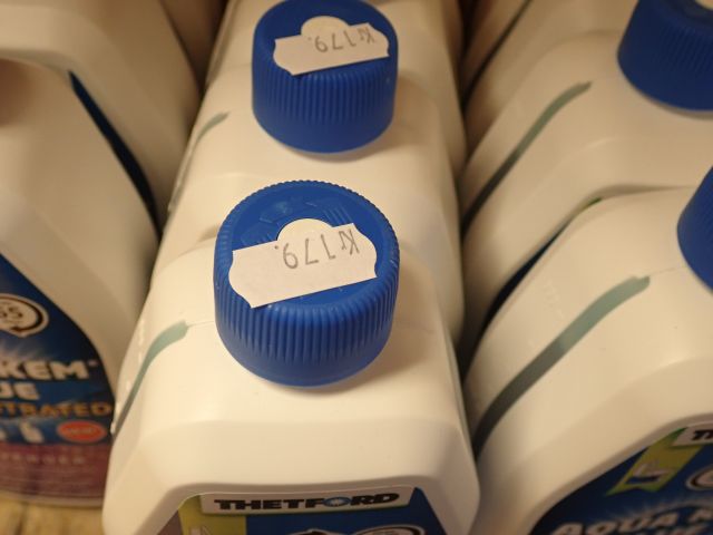 577614-3 11 bottles with Aqua Kem blue