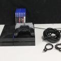 550096-1 Sony Playstation PS4 with controls and games