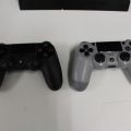 550096-3 Sony Playstation PS4 with controls and games