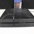 550096-6 Sony Playstation PS4 with controls and games