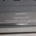 550096-8 Sony Playstation PS4 with controls and games