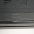 550096-9 Sony Playstation PS4 with controls and games