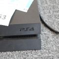 550453-4 Sony Playstation PS4 with game control