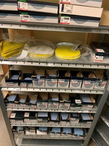 559868-5 Abrasive material including storage shelf