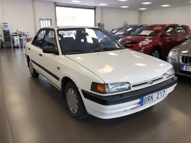 554945-2 Mazda 323 Sedan 1.3 Manual, 73hp, 1995