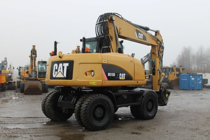 626476-3 Wheel excavator CAT 315D -2010 (rotary tilt, scan laser, 9633 h)