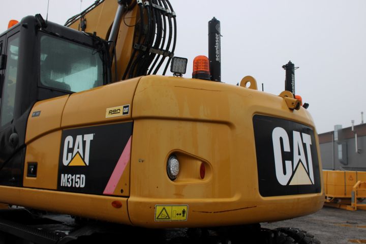 626476-9 Wheel excavator CAT 315D -2010 (rotary tilt, scan laser, 9633 h)